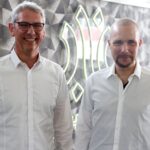 Das Bild zeigt Michael Hagedorn, CEO von Materna, und Jonas Andrulis, CEO von Aleph Alpha.