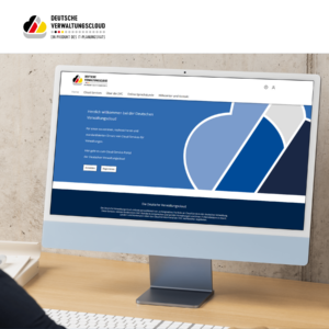 Auf einem Monitor ist die Startseite der Deutschen Verwaltungscloud zu sehen