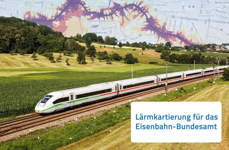 Landschaft, die von einem ICE durchquert wird.