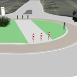 Ein in der Software card_1 dargestellter Lkw umfährt eine Straßenverkehrsinsel.