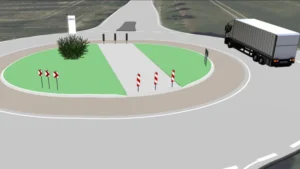 Ein in der Software card_1 dargestellter Lkw umfährt eine Straßenverkehrsinsel.