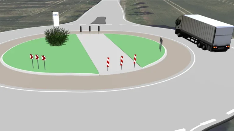 Ein in der Software card_1 dargestellter Lkw umfährt eine Straßenverkehrsinsel.